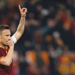 Roma's legendary captain  celebrating his team's win against Udinese this season.