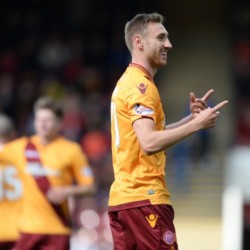 Dundee look to keep Motherwell striker Moult quiet